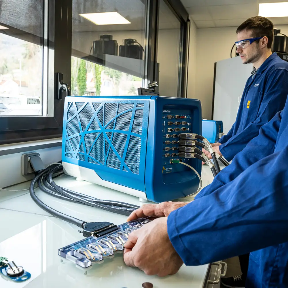Scientist working with electrochemistry equipment